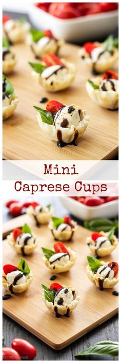 mini caprese cups on a cutting board with red peppers and green leaves in the middle