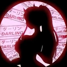 the silhouette of a woman is shown in front of a circular sign with writing on it