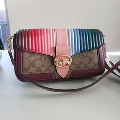 Reposhing This Item I Purchased From @Brisnad. Loved It, But Ready To Rotate For Something New. Questions? Leave A Comment Below! Georgie Coach Bag, Signature Canvas, Pink Brown, Coach Bags, Something New, Crossbody Bags, Bag Lady, Rainbow, Canvas