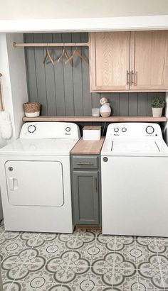 a washer and dryer in a small room