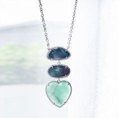 Australian boulder opals are matched with a carved emerald heart in this breathtaking one of a kind necklace. Carved Emerald, Beauty Confidence, Australian Boulder Opal, Purse Styles, Stone Heart, Purse Jewelry, Jewelry Silver