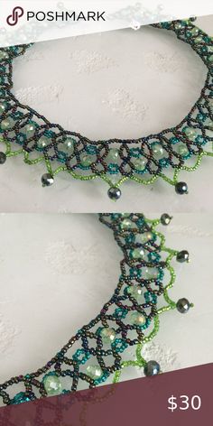 Czech Bead 20" CARMEN Necklace IRIDESCENT GREENS Czech Glass Bead 20" long "CARMEN" STYLE Necklace Beautiful IRIDESCENT GREENS in a BEADED CROCHETED LACE STYLE Easy to open/close magnetic clasp Because of the handmade nature; no two necklaces are exactly the same A gorgeous necklace made in Guatemala using artisan crafted Czech Glass beads. Czech glass beads are know world wide for their quality. Principles of fair trade are upheld. Please visit our Posh Closet for complete Enchanted line: neckl Iridescent Round Beads For Jewelry Making, Iridescent Colorful Beaded Necklace, Handmade Iridescent Beaded Necklaces With Round Beads, Gift Iridescent Crystal Necklace With Round Beads, Bohemian Iridescent Beaded Jewelry, Iridescent Beaded Round Bead Jewelry, Iridescent Beaded Crystal Necklace Gift, Iridescent Beaded Crystal Necklace As A Gift, Iridescent Beaded Crystal Necklace For Gifts