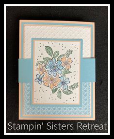 a card with flowers on it and the words stampin'sisters rereaat