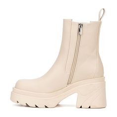 Take firm steps this cold weather season in the Tessa Chelsea boots. Featuring a classic elastic gore for comfort, side zip fastening and a lugged sole.Closure Type: Side ZipperShaft Circumference: 10 1/2 InchesBoot Shaft Height: 7 1/4 InchesShoe Heel Height: 3 1/4 InchesUpper/Outer Base Material: 85% Polyurethene, 15% TextileShoe Lining Material: FabricSole Material Content: 100% Thermoplastic-RubberCalf Width: RegularToe Type: Round Toe, Closed Toe, Plain ToeHeel Style: Block HeelCountry of O… Beige Boots With Zipper Closure And Round Toe, High Ankle Boots With Zipper Closure For Winter, Winter High Ankle Boots With Zipper Closure, Beige Ankle-high Boots With Zipper Closure, Winter Synthetic Boots With Zipper Closure, Winter Synthetic Boots With Zipper, Casual Beige Boots With Zipper Closure, Round Toe Platform Boots With Zipper Closure, Platform Boots With Zipper Closure And Round Toe