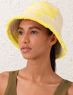 The Jacquard Towel Bucket Hat in Yellow/Cream from our Summer Swim 2024 Collection. A cotton bucket hat featuring topstitching around the brim and ventilation in the crown. Yellow Cotton Bucket Hat With Short Brim, Yellow Cotton Bucket Hat With Curved Brim, Yellow Cotton Wide Brim Bucket Hat, Yellow Wide Brim Cotton Bucket Hat, Swim 2024, Resort Accessories, Cotton Bucket Hat, One Piece Clothing, Resort Dresses