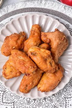 fried chicken wings on a white plate