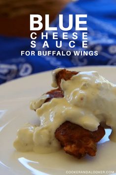 blue cheese sauce for buffalo wings on a white plate with text overlay that reads, blue cheese sauce for buffalo wings