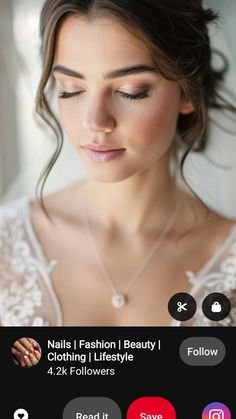 a woman with her eyes closed wearing a white dress and pearls on the necklace is looking down