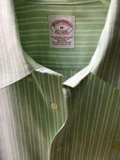 Traditional fit brooks brothers  shirt  Chest : approximately 23 Sleeve approximately from shoulder to cuff 24.75 Shirt has been professionally laundered and ready to wear  00045 Classic Green Business Casual Shirt, Green Business Shirt With Button Closure, Green Cotton Business Shirt, Green Cotton Collared Dress Shirt, Classic Green Dress Shirt With Spread Collar, Classic Green Cotton Dress Shirt, Green Cotton Dress Shirt For Business, Green Cotton Business Dress Shirt, Classic Green Button-up Dress Shirt