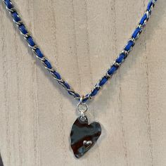 Handmade By Shelly, One-Of-A-Kind, Fashion, Jewelry. Brand New. Silver Tone Chain With Purple/Blue Suede Leather Intertwined. Lobster Clad Closure. Heart Is Approximately 1x1.5” In Size. #358 Blue Heart Necklace With Adjustable Chain, Blue Heart Beads Necklace In Heart Shape, Blue Heart Beads Heart-shaped Necklace, Blue Heart Beads Heart Necklace, Blue Heart Charm Necklace For Valentine's Day, Adjustable Blue Necklaces For Valentine's Day, Blue Adjustable Necklace For Valentine's Day, Adjustable Blue Necklace For Valentine's Day, Nickel-free Blue Heart Necklaces