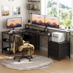 a computer desk with two monitors and a printer