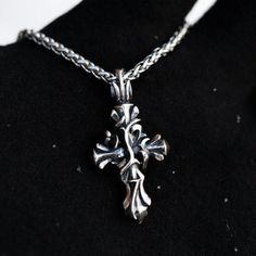 (Pendant Only - No Chain Included) Introducing Our Exquisite Entangled Vine Cross Pendant, A Symbol Of Faith And Beauty Crafted From High-Quality Solid 925 Sterling Silver. Measuring 1.65 Inches In Height And 0.87 Inches In Width, This Stunning Pendant Is Intricately Designed With A Combination Of Twisting Vines And An Elegant Cross. This Pendant Is A True Masterpiece, With Every Detail Crafted With Precision And Care. The Entangled Vine Design Is Beautifully Intertwined With The Cross, Creating Mens Silver Pendants, Buddhist Necklace, Ruby Necklace Pendant, Compass Pendant, Beauty Crafts, Vine Design, Pendent Necklace, Mens Leather Bracelet, Mens Accessories Jewelry