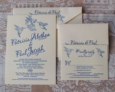 wedding stationery with blue ink on white paper