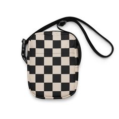 It's a Retro Revival! This bag is sturdy, stylish, and ready to go wherever you do. With adjustable straps and two spacious pockets, it’s the ultimate accessory for hiking, festivals, and everyday use. Featuring an all-over print of a retro black and cream checkerboard pattern, this crossbody bag adds a bold and timeless twist to any outfit. Perfect for a 90s-inspired back-to-school look, it's both functional and fashionable. Key Features: 100% polyester Fabric weight: 9.91 oz./yd.² (336 g/m²) B Retro Black Shoulder Bag For School, Retro Black Shoulder Bag With Removable Pouch, Black Retro Shoulder Bag With Removable Pouch, Retro Black Crossbody Shoulder Bag, Retro Shoulder Bag For Streetwear, Black Shoulder Bag With Adjustable Straps For Outdoor, Retro Rectangular Bags For Outdoor Activities, Retro Bags With Adjustable Strap, Retro Outdoor Bags With Adjustable Strap