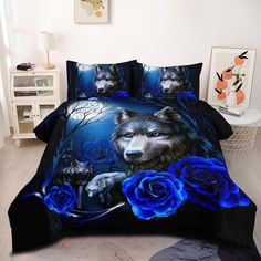 a bed with blue roses and two wolfs on it