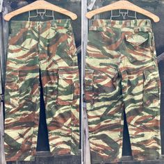 Unisex Military Pants, 100% cotton. Brush stroke, Tap 47/56  Made in France. Genuine French Army Paratrooper Size Small. Amazing quality and detail. Brush-stroke pattern. Waist 29 inches Hips 39 inches Inside leg 24 inch (Hand turned) Rise 11.5 inches Leg bottoms, 15 inches Excellent worn condition with small paint stain  to rear (see pic) Rear pocket pressed stud broken. Fly fronted 4 Outside front pockets and 1 rear with flaps and poppers ---------------------------------------------------- Me Camouflage Cotton Pants With Side Pockets, Cotton Camouflage Bottoms With Patch Pockets, Camouflage Cotton Full-length Cargo Pants, Full Length Camouflage Cotton Cargo Pants, Camouflage Cotton Cargo Pants With Patch Pockets, Camouflage Cotton Combat Cargo Pants, Camouflage Combat Cargo Pants In Cotton, Combat Style Camouflage Cargo Pants, Army Paratrooper