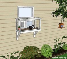 a cat sitting in a window box on the side of a house