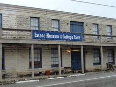 an old building with a sign that says salato museum and college park