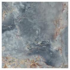 an abstract marble pattern with gold and grey colors on the top, bottom and bottom