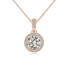 This 14k rose gold pendant features a round claw prong set diamond that shines endlessly. Glimmering round diamonds surround the center gem to form a beautiful halo. The lustrous bale is also encrusted with glistening diamond accents for extra sparkle. This diamond halo pendant is crafted to stand out. Round Diamond Halo, Diamond Pendants, Best View, Claw Prong, Halo Pendant, Rose Gold Pendant, Yellow Gold Pendants, Diamond Halo, Halo Diamond