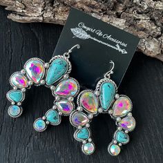 Brand New Sparkling Ab Rhinestone Squash Blossom Earrings With Turquoise Accent Stones. Super Gorgeous & Sparkly Earrings. High Quality. This Item Is Nwt From My Boutique. Bling Turquoise Jewelry, Rodeo Jewelry, Western Jewelry, Southwestern Jewelry, Cowgirl Jewelry, Boho Jewelry, Silver Jewelry, Country Girl, Boots, Boho, Gypsy, Tribal, Aztec, Navajo, Southern, Southwest, Western, Rodeo, Cowgirl Style, Dojo, Bohemian, Nwt, Zuni, Gift, Jeweled, Jewelry Accessories, Southwestern Flair Native Jewe Turquoise Wedding Jewelry, Country Girl Boots, Jewelry Cowgirl, Jewelry Country, Horse Wagon, Rodeo Jewelry, Western Family, Boots Boho, Cattle Farm