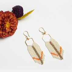 * These handmade earrings are designed using find Japanese seed beads. It's very lightweight and comfortable to wear. * It comes with a small Carnelian gemstone (orange selection)  * The earrings hook and the hexagon are gold plated and nickel free. Beaded Fringe Earrings, Le Crochet, Earrings Beaded, Beaded Fringe, Hexagon Shape, Fringe Earrings, Handmade Earrings, Beaded Earrings, Seed Beads