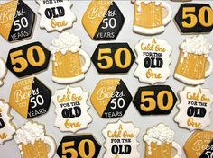 decorated cookies with beer and 50 years on them