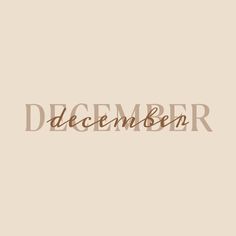 the word december written in brown ink on a beige background