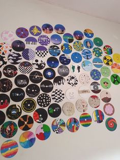 a wall covered in lots of different colored buttons