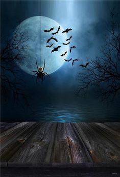 an image of halloween scene with bats flying over the water and full moon in background