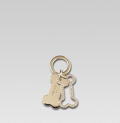 a keychain with a dog bone on it