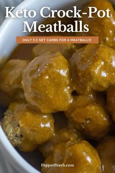 a white bowl filled with meatballs covered in gravy