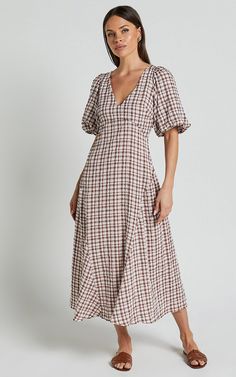 Jameela Midi Dress - V Neck Short Puff Sleeve Godet A Line Smock Dress in Chocolate Gingham | Showpo USA Fitted V-neck Midi Dress For Picnic, Gingham Dress With Smocked Bodice And Short Sleeves, Gingham Short Sleeve Dress With Smocked Bodice, Short Sleeve Gingham Dress With Smocked Bodice, Fitted V-neck Plaid Dress For Spring, Spring V-neck Midi Dress For Picnic, V-neck Midi Dress For Spring Picnic, Gingham Dresses With Smocked Bodice And Puff Sleeves, Fitted Gingham Plaid Dress With V-neck