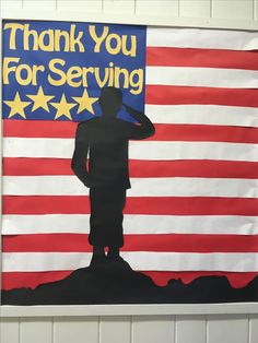 a thank you for serving sign with a soldier holding an american flag in the background