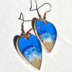 Summer Heart-shaped Gold Jewelry, Heart Charm Beach Jewelry, Blue Resin Jewelry For Summer, Resin Heart Charm Pendant Jewelry, Resin Jewelry For Summer Gifts, Summer Gift Jewelry Made Of Resin, Handmade Ocean-inspired Resin Jewelry, Resin Drop Earrings For Beach, Unique Hand Painted Jewelry For Beach