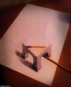 a piece of paper that has been drawn with pencils on top of it and an object next to it