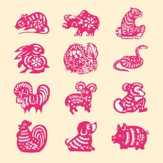 red paper cut animals on a beige background