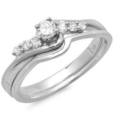 a white gold wedding ring set with three stones