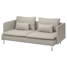 an image of a couch with pillows on it's back and side cushions that are off white