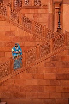 a person on a skateboard going down some stairs