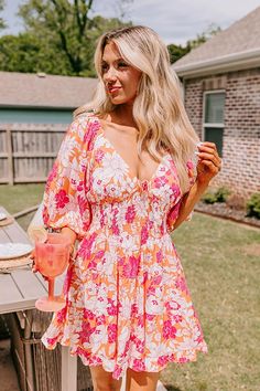 - Become a style muse with this gorgeous dress! Fully lined material - A v-cut neckline with a tie detail - Short, loose sleeves with elastic shoulders and elastic cuffs - A smocked bodice - A figure flattering silhouette that ends in a ruffled hemline Measurements S : Bust 32", Hip 36", Length 32", Sleeve Length 13.5", Waist 26-30". M : Bust 34", Hip 38", Length 33", Sleeve Length 14", Waist 28-32". L : Bust 36", Hip 40", Length 33.5", Sleeve Length 14", Waist 30-34". Flowy V-neck Sundress For Garden Party, Summer Party V-neck Dress, Bohemian V-neck Dress With Smocked Back, V-neck Maxi Dress With Smocked Back For Vacation, V-neck Maxi Dress With Gathered Sleeves For Brunch, V-neck Dress With Smocked Back For Brunch, Casual V-neck Maxi Dress With Gathered Sleeves, Vacation V-neck Midi Dress With Gathered Sleeves, Feminine V-neck Sundress For Brunch