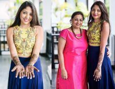 two women standing next to each other with their hands on their hips and arms crossed