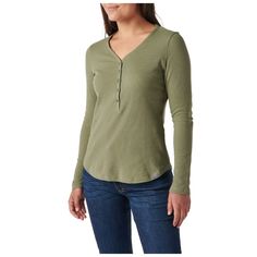 Introducing your favorite new top. The versatile Willa Long Sleeve Henley is ready for everything the day brings. This fashionable pullover features a cozy waffle knit made from a cotton-polyester blend with a bit of elastane for an incredibly comfortable fit. Snap buttons allow you to easily adjust the scoop neck to complement your outfit. Wear the Willa as a stand-alone top or paired with a tee or camisole underneath. The shirttail hem looks stylish with jeans, pants or a skirt. Dress the Willa up for work or down for the weekend—the choice is yours. | 5.11 Tactical Women's Willa Long Sleeve Henley Shirt In Tank Green | Size Small Everyday Long Sleeve Waffle Knit Tops, Everyday Fall Waffle Knit Top, Comfortable Cotton Ribbed Top, Comfortable Ribbed Cotton Tops, Everyday Versatile Top, Cozy Pullover, Henley Shirt, Weekend Outfit, Pullover Designs