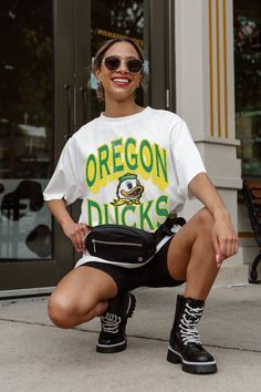 Game day just got better with our oversized crewneck tee. This relaxed fit, short sleeve crewneck tee with ribbed neckline is a versatile addition to any wardrobe. Crafted from 100% cotton, it promises a soft touch and lasting durability. Perfect for fans who want to be super comfortable without sacrificing style! Oversized Crewneck, Oregon Ducks, Ribbed Neckline, Ducks, Game Day, Oregon, Fitness Models, Relaxed Fit, Crew Neck