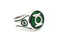 a green ring with the letter o on it