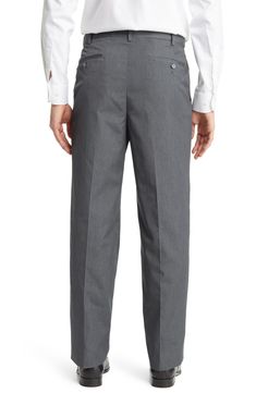 A clean flat-front cut styles sharp trousers fashioned from cotton-kissed poplin and fitted with a self-sizer waistband to ensure a custom fit. 37" inseam; 18" leg opening; 10 1/2" front rise 65% polyester, 35% cotton Machine wash, tumble dry Imported Classic Slim Fit Bottoms With Standard Cut Leg, Classic Fitted Chinos With Belt Loops, Elegant Spring Pants With Standard Cut Leg, Fitted Dress Pants With Hip Pockets For Spring, Slim Fit Cotton Bottoms With Flat Front, Fitted Chinos With Hip Pockets And Straight Hem, Fitted Chinos With Belt Loops For Formal Occasions, Formal Fitted Chinos With Belt Loops, Fitted Formal Chinos With Belt Loops