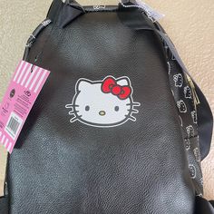 Black Hello Kitty Mini Backpack, Nwt Trendy Hello Kitty Backpack, Trendy Hello Kitty Print Backpack, Black Cat Design School Backpack, Black Cat Design Backpack For School, Black School Backpack With Cat Design, Trendy Hello Kitty Backpack For Travel, Everyday Hello Kitty Backpack, Black Backpack With Cat Design, Cute Black Backpack For Back To School