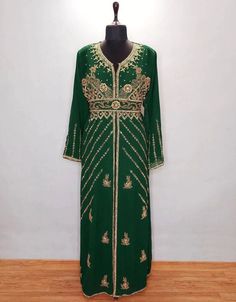 Mashallah! ❤️ Muslim Wedding moroccan Style caftan Green 👗 Shop latest Kaftan which are made up from best quality fabrics with latest styles from our large collections at https://bit.ly/3eafqPe Shop Now : https://bit.ly/3MbgLV8 Buy online @ $96.5 #kaftandressdesign #kaftandressesforeid #kaftanstyleformaldresses #longeveningkaftandresses #middleeasternkaftandresses #arabicattire #caftan Luxury Green Floor-length Kaftan, Floor Length Jacket, Farasha Abaya, Arabian Dress, Embroidered Kaftan, Modest Evening Dress, Beach Wedding Gown, Long Length Dresses, Hand Embroidery Dress