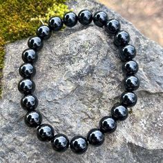 This Handmade Black Onyx Crystal Gemstone Stretch Bracelet Is Perfect For Every Day Wear. We Only Use High Quality Gemstones, Crystals, Beads And Slabs In Our Handmade Pieces. Black Onyx Is A Calming Gemstone. It Is Beneficial In Helping With Emotional Challenges Like Anxiety And Grief. It May Also Help With Motivation And Can Help With Adjusting To New Situations Without Being Overwhelmed. Please Note That We Use Natural Gemstones So There Will Be Slight Variations Than Pictured. Material: Gems Sapphire Heart Necklace, Black Onyx Crystal, Sterling Silver Heart Bracelet, Crystals Beads, Onyx Crystal, Metal Cuff Bracelet, Floating Necklace, Gemstones Crystals, Gold Bracelet Cuff