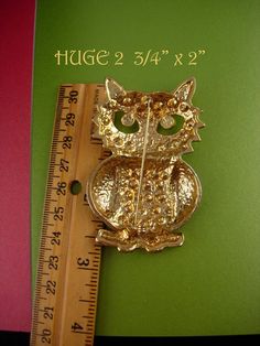 For the teacher or bookworm, this adorable owl has see thru eyes so the color you wear it on will change the look of the brooch. Really big and well made. Suprised it is not signed. 1-1-19 Gold Novelty Brooches For Gifts, Owl Brooch, Figural Jewelry, Wedding Bottles, Viking Glass, Tie Gifts, Brooch Vintage, Liquor Bottles, Tie Bar